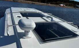 Surf board frame on a power boat