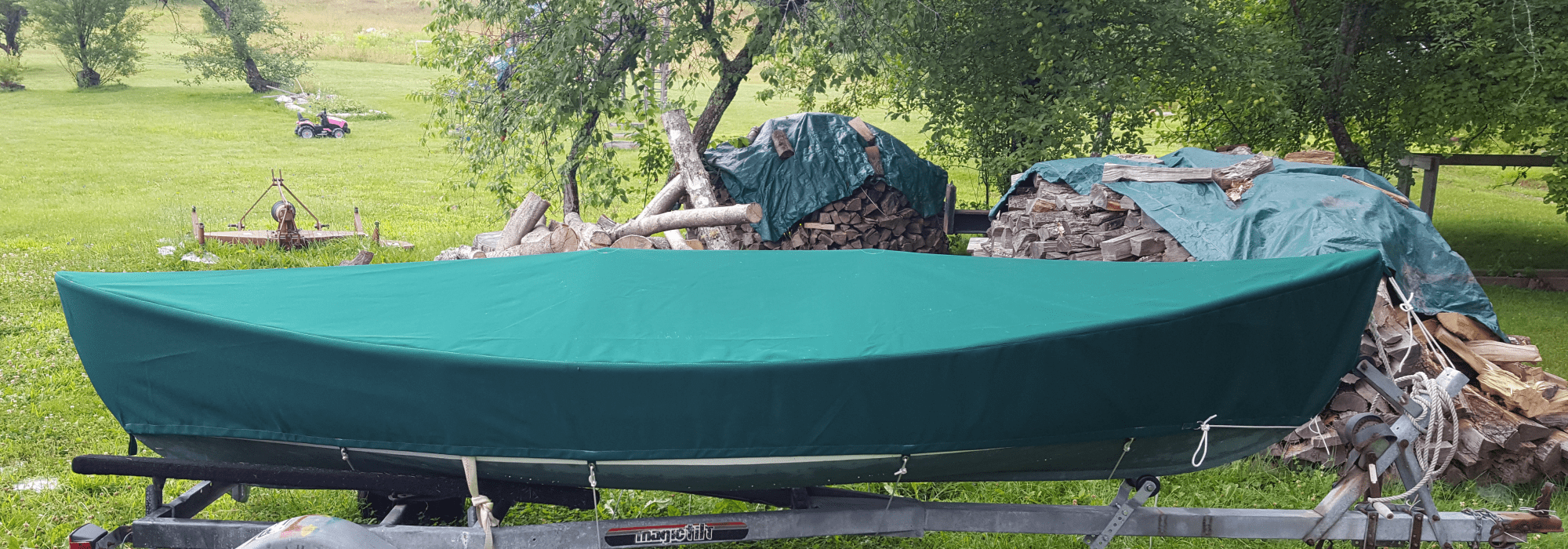 Frequently asked questions - small boat on trailer in a field